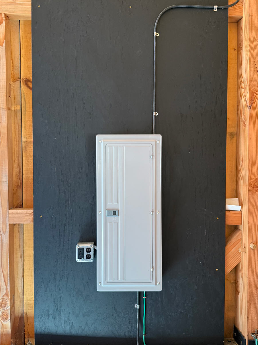 New residential electrical panel with labeled breakers